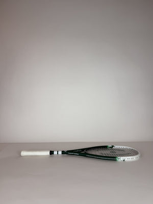 Harrow Concord Academy Vapor squash racket, lying on its side